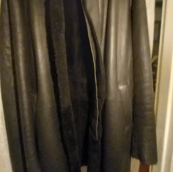 Medium DKNY 3/4 length lambskin shearling.